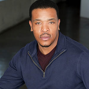 Russell Hornsby serious portrait.
